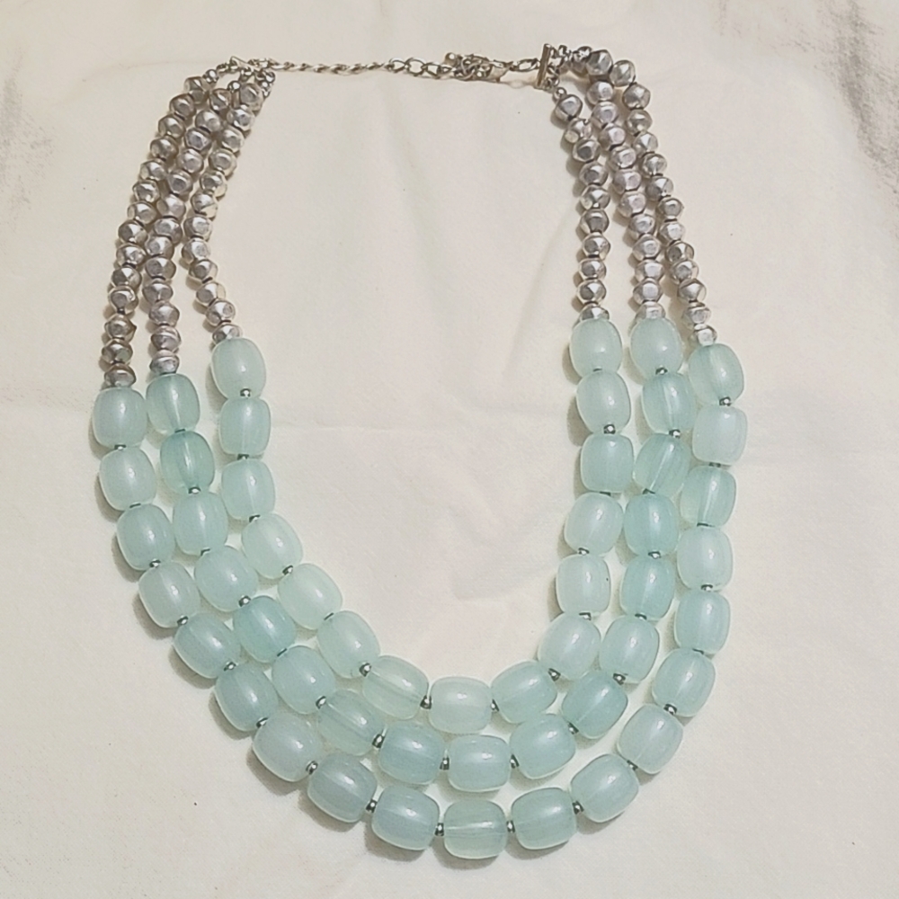 Unbranded three strand turquoise and silver bead necklace.  20 inches long